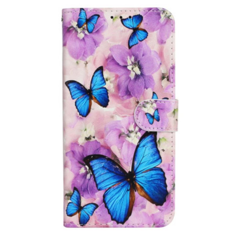 Housse iPhone 16 Plus Papillons et Fleurs Pourpres à Lanière