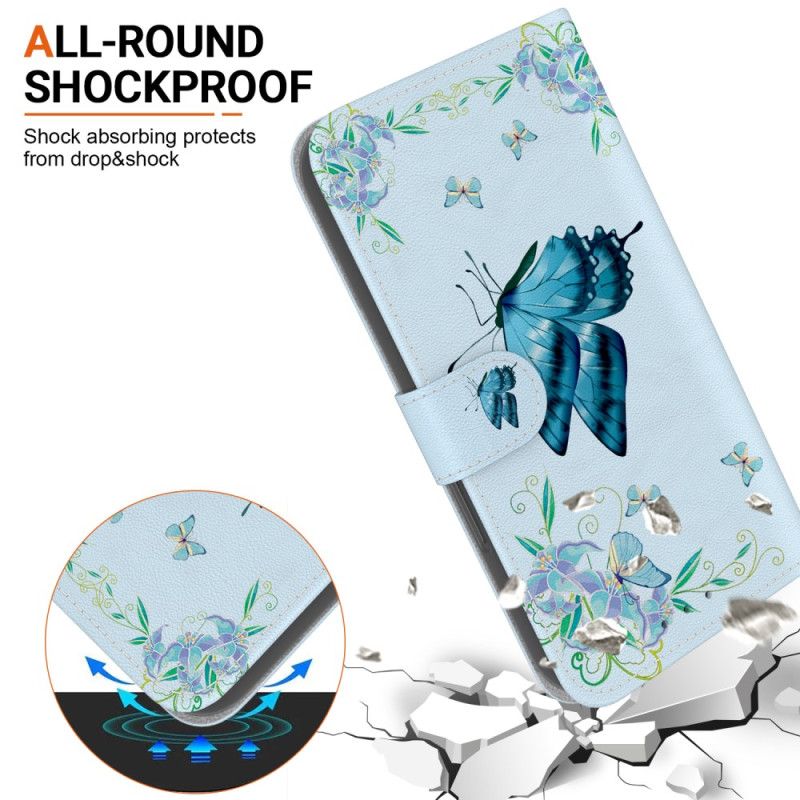 Housse iPhone 16 Pro Max Papillon Bleu et Fleurs à Lanière