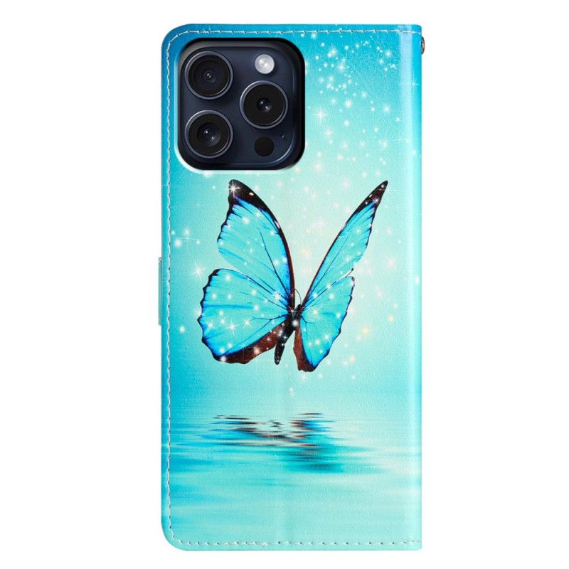 Housse iPhone 16 Pro Max Papillon Bleu sur l'Eau à Lanière