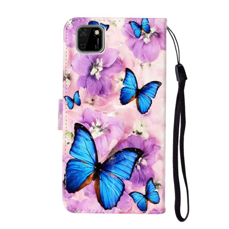 Housse Huawei Y5p Papillons Bleus Dans Les Fleurs