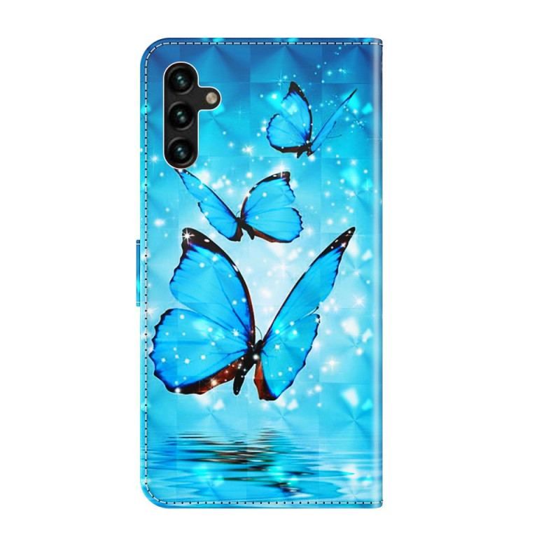 Housse Samsung Galaxy A13 5G / A04s Papillons Bleus Volants