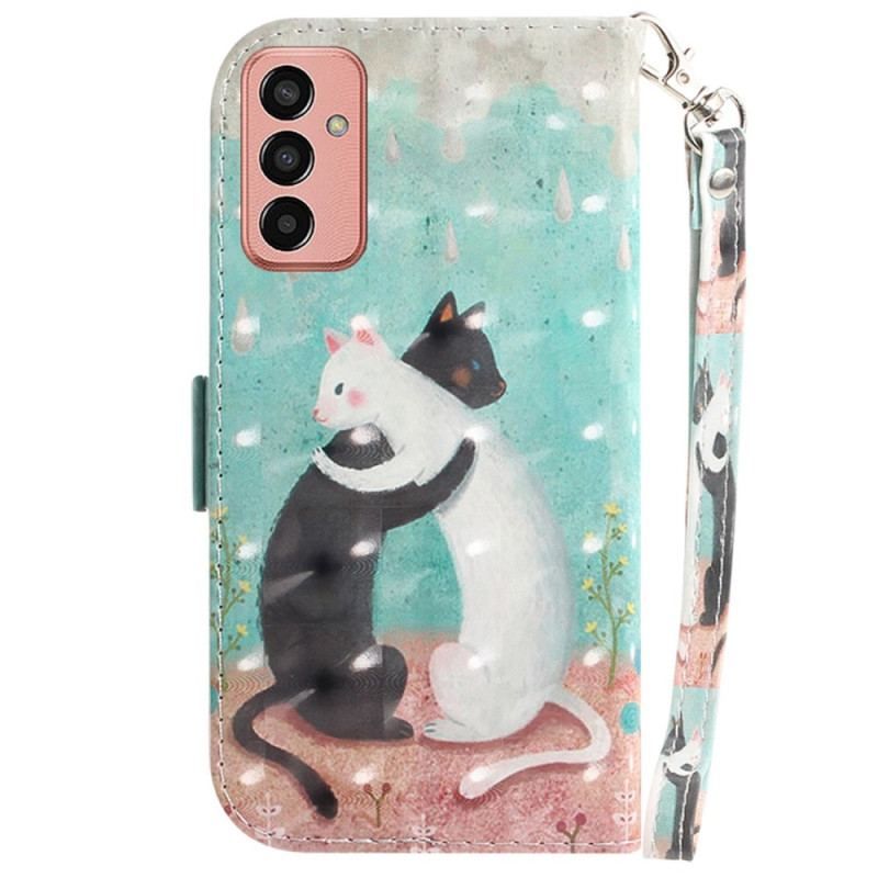 Housse Samsung Galaxy M13 Dancing Cats avec Lanière