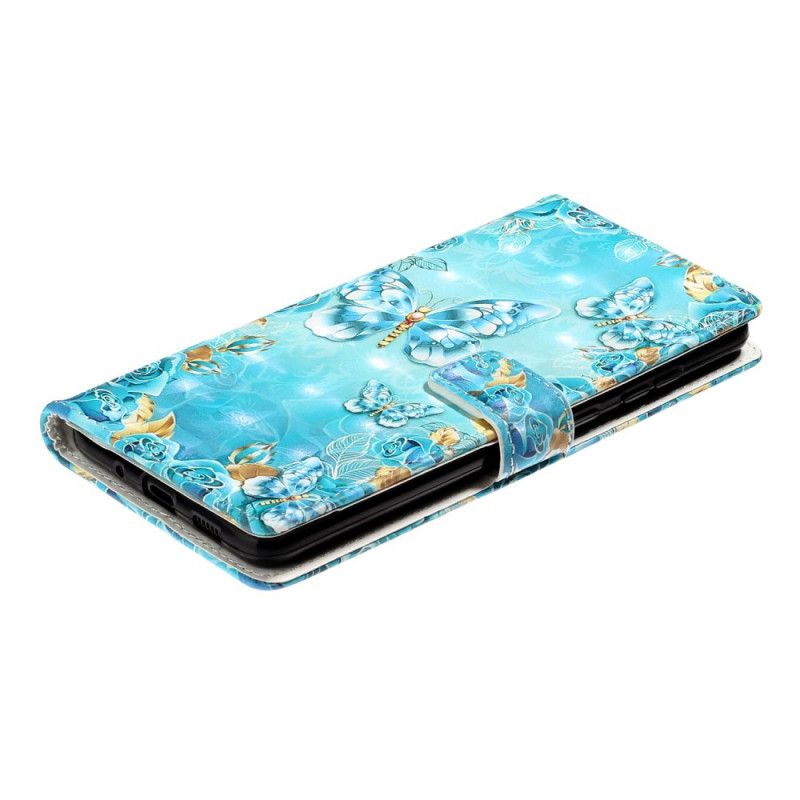 Housse Samsung Galaxy S20 Ultra Papillons Et Fleurs Sur Fond Bleu