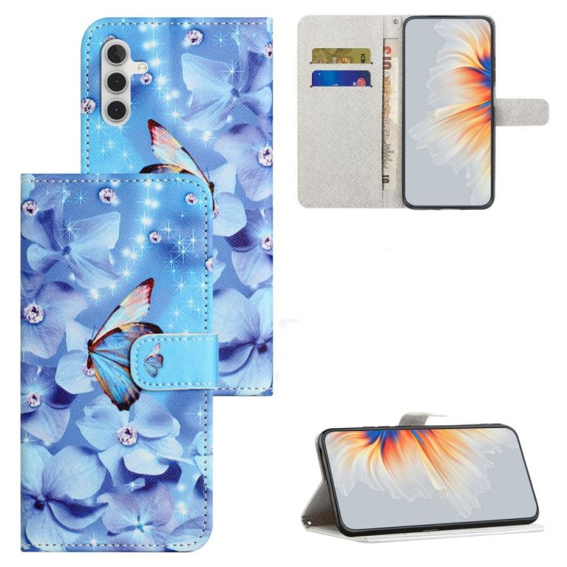 Housse Samsung Galaxy S24 FE Fleurs et Papillons Bleus à Lanière