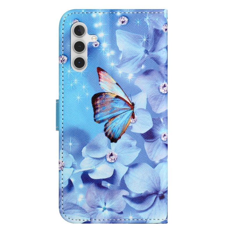 Housse Samsung Galaxy S24 FE Fleurs et Papillons Bleus à Lanière