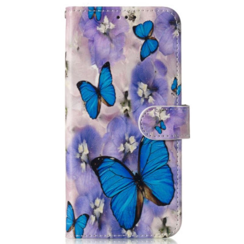 Housse Samsung Galaxy S24 FE Fleurs Violettes et Papillons Bleus