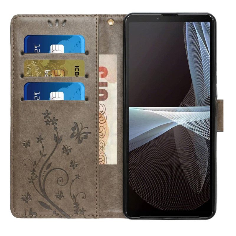 Housse Sony Xperia 1 VI Fleurs et Papillons à Lanière