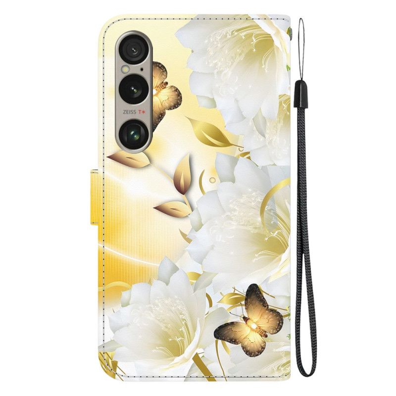 Housse Sony Xperia 1 VI Papillons Dorés et Fleurs Blanches à Lanière