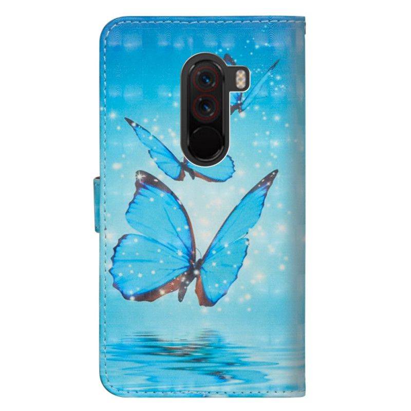 Housse Xiaomi Pocophone F1 Papillons Bleus Volants