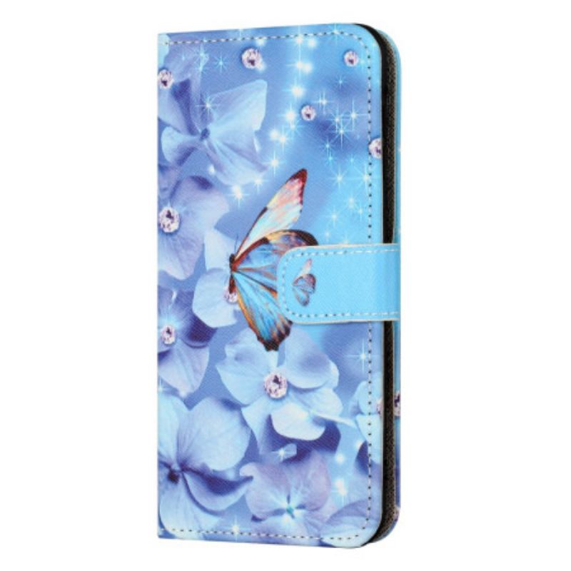 Housse Xiaomi Redmi Note 13 4G Fleurs et Papillon Bleus à Lanière